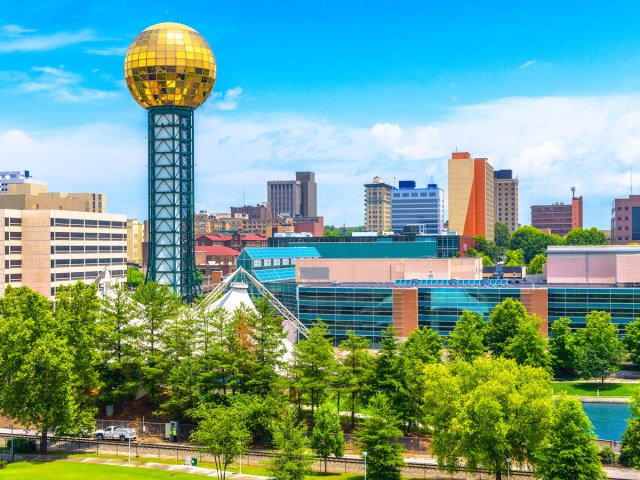 Gold-plated Sunsphere building over Knoxville skyline