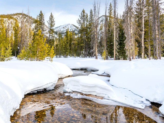 River through snowy mountain landscape in Idaho