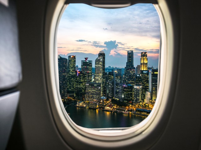 View of skyscrapers outside of airplane window