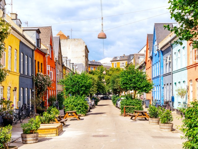 Colorful buildings lining pedestrian street in Copenhagen, Denmark