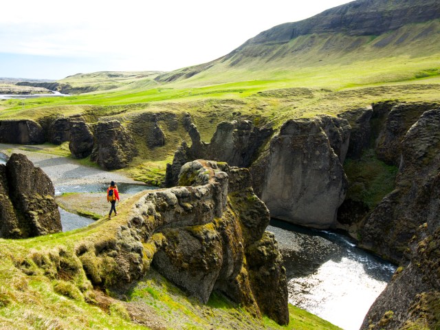 Person hiking in Icelandic canyon
