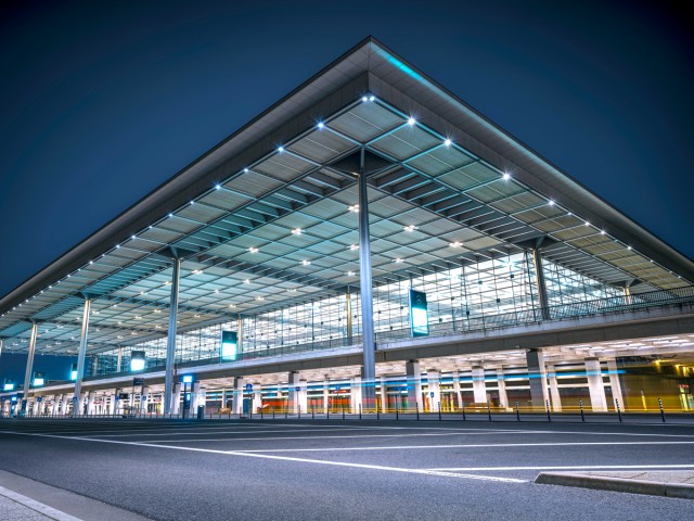 Terminal building at Berlin Brandenburg Airport illuminated at night
