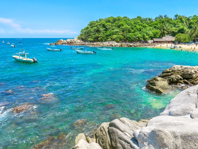 Boats in bay off coast of Puerto Escondido, Mexico