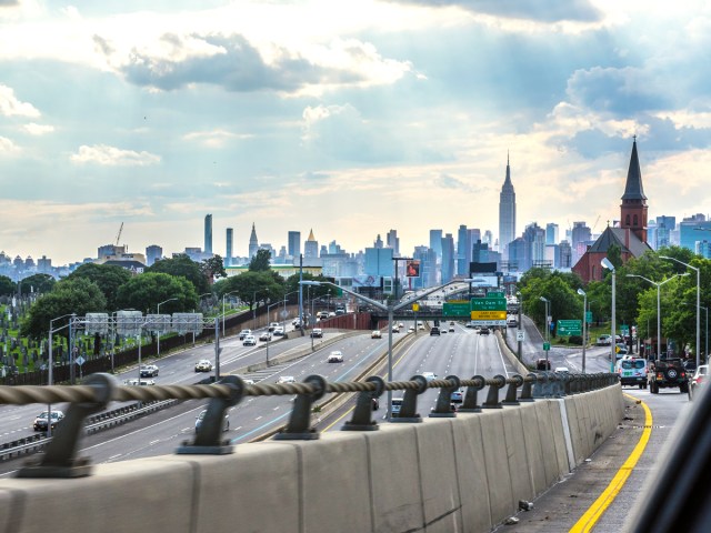 Highway onramp with view of Manhattan skyline
