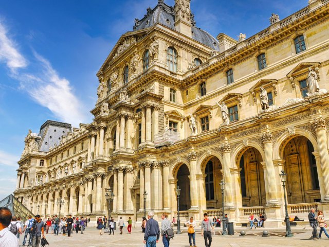 Crowds outside the Louvre in Paris, France