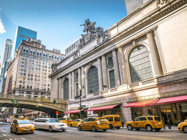 Taxi cabs passing Grand Central Terminal in New York City