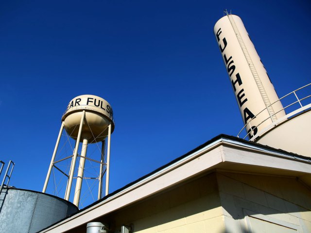 Water tower and smoke stack in Fulshear, Texas