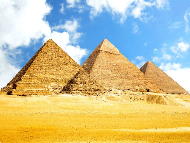 The Pyramids of Giza amid desert landscape of Egypt