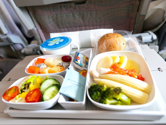 Emirates meal on aircraft tray table