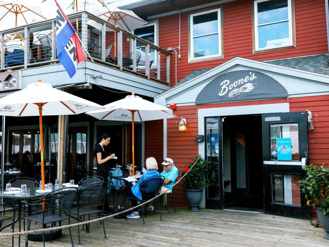 Diners on patio at restaurant in Portland, Maine