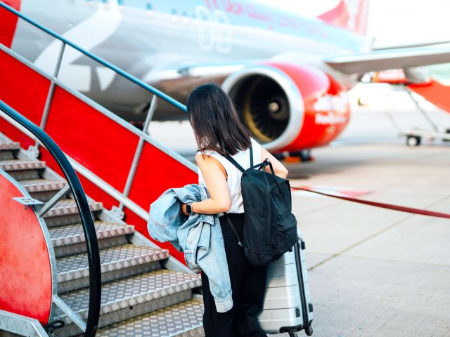Passenger boarding jet via air stairs