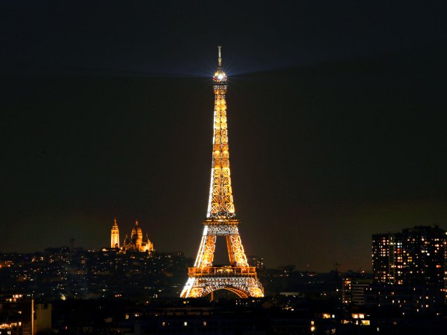 The Eiffel Tower in Paris, France, illuminated at night