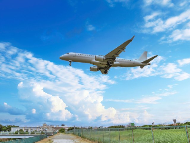 Airplane on final approach to land on runway