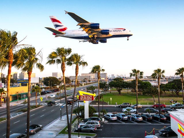 British Airways Airbus A380 landing at Los Angeles International Airport above In-n-Out restaurant