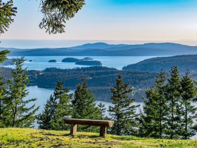 Bench on hilltop overlooking the San Juan Islands in Washington