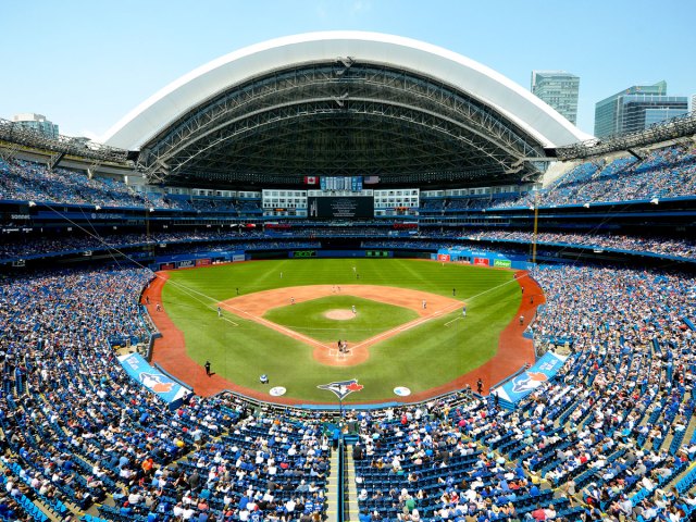 Game taking place under partially closed roof of Rogers Centre in Toronto, Ontario
