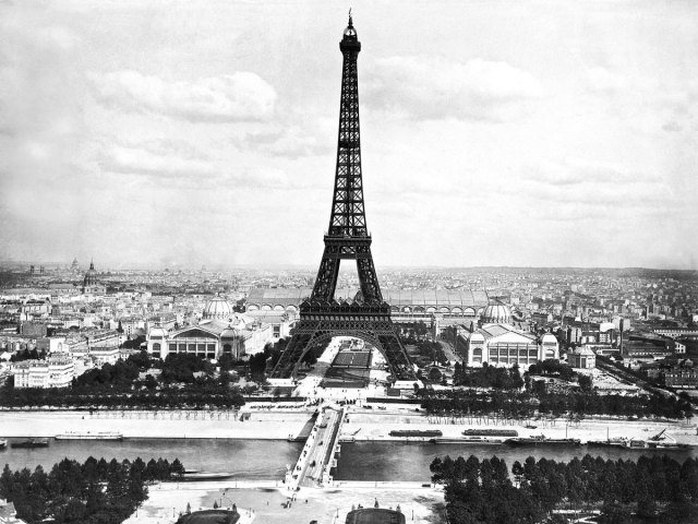 Historical image of the Eiffel Tower and Paris skyline in the late 1800s