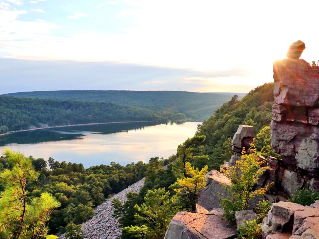 Rocky point overlooking Wisconsin lake at sunset
