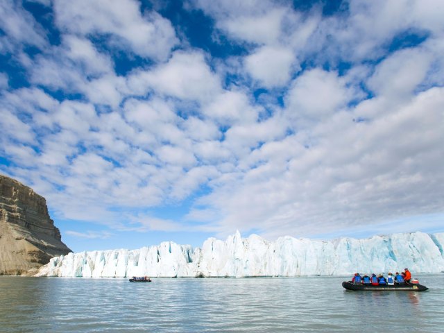 Zodiac tour observing glacier in Croker Bay, Canada