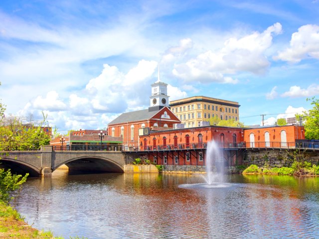 Bridge over river with fountain in Nashua, New Hampshire