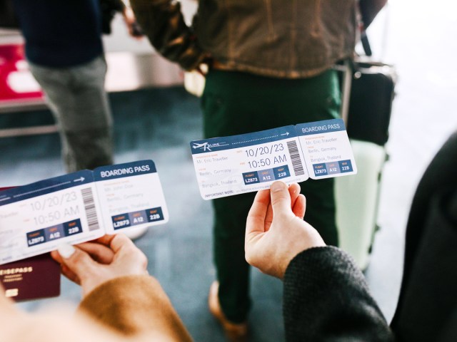 Passengers holding boarding passes