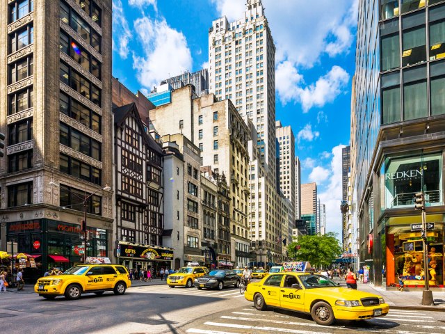 Yellow cabs on busy Manhattan street