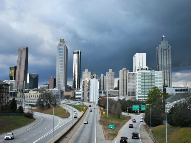 Atlanta skyline under storm clouds