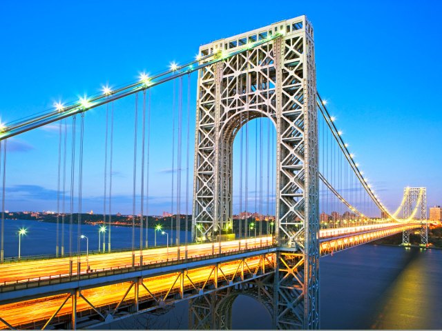 George Washington Bridge in New York City illuminated at night